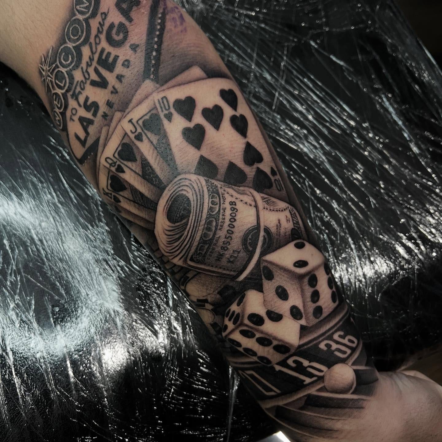 Black and grey realism Las Vegas gambling themed sleeve tattoo by Nicholas Tattoo, Camden NSW