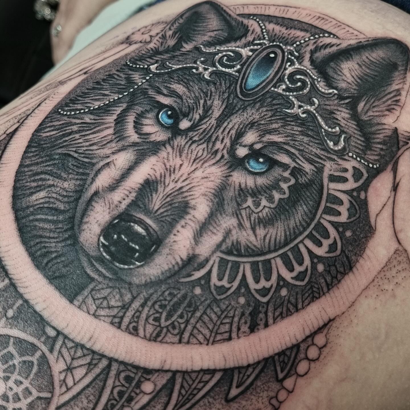 Black and grey realism wolf head with jewelry and mandala tattoo by Nicholas Tattoo, Camden NSW