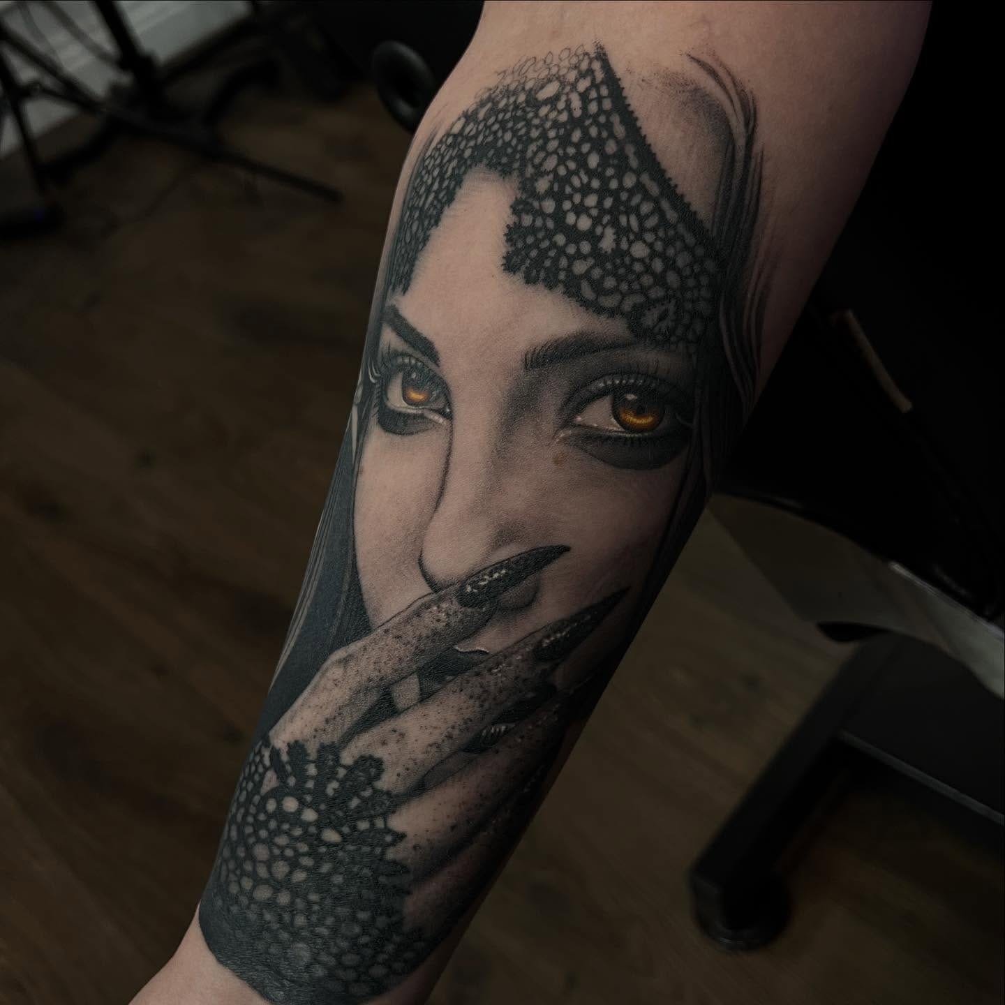 Black and grey realism woman portrait with lace veil tattoo by Nicholas Tattoo, Camden NSW