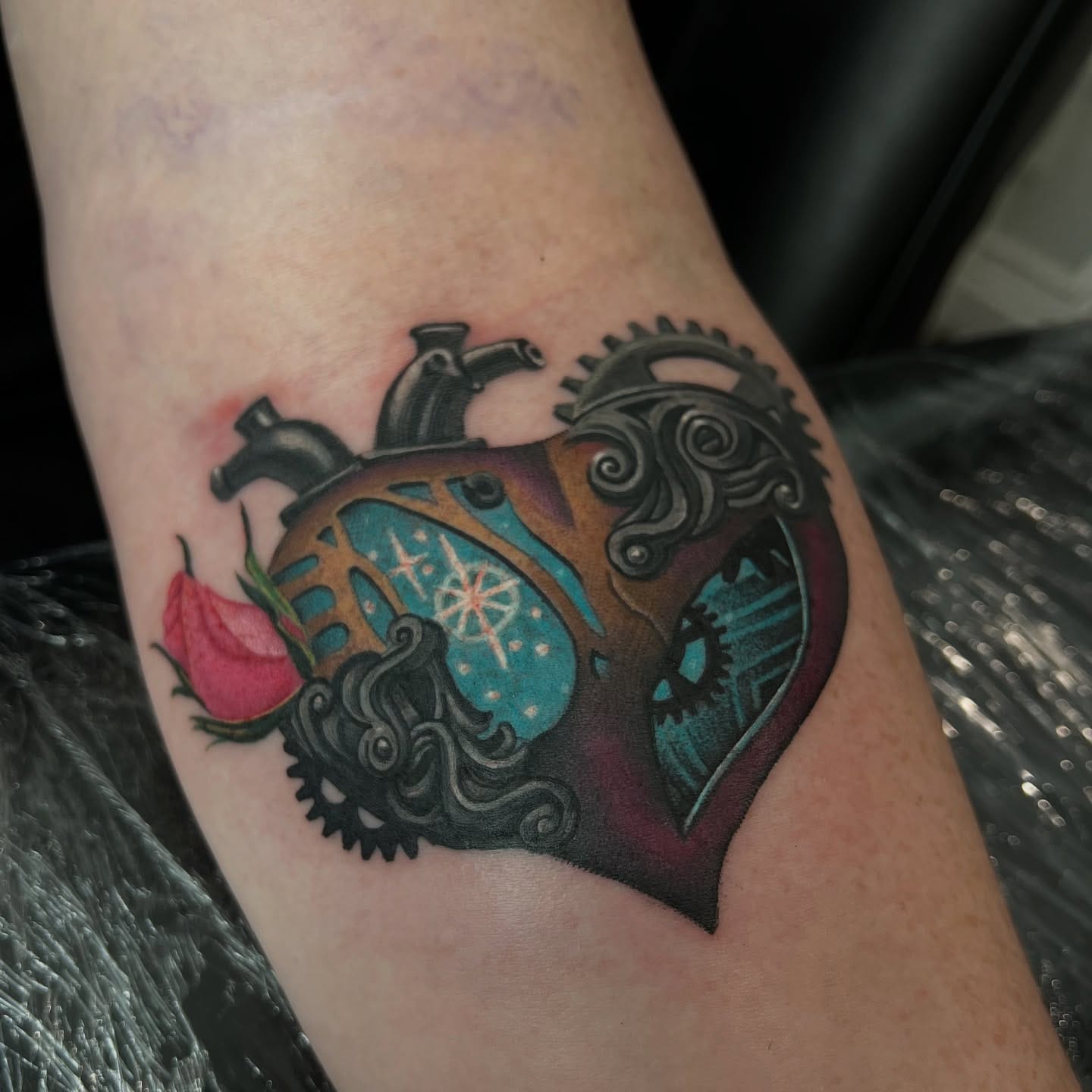 Colour steampunk mechanical heart with gears tattoo by Nicholas Tattoo, Camden NSW